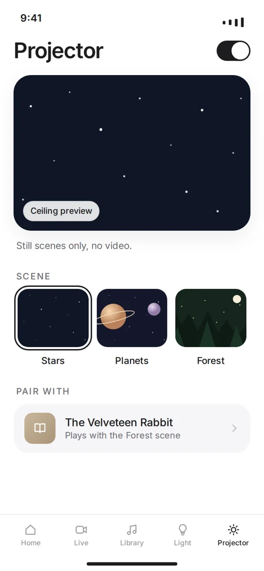 The app's Projector screen: stars, planets and forest scenes