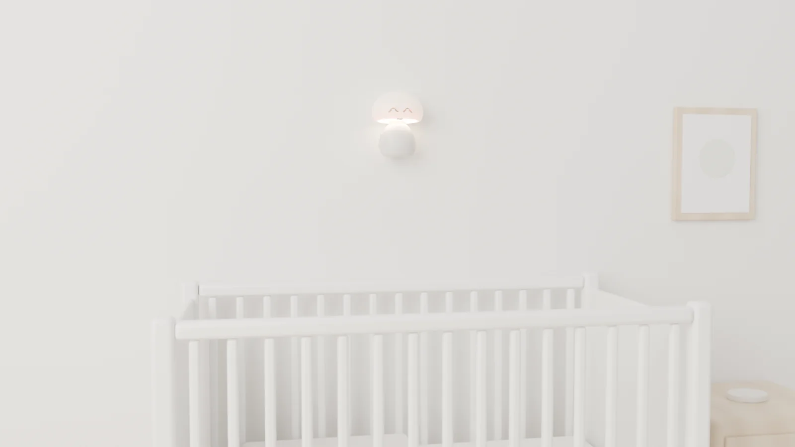 The device mounted on a white wall above a crib, its cap glowing warm